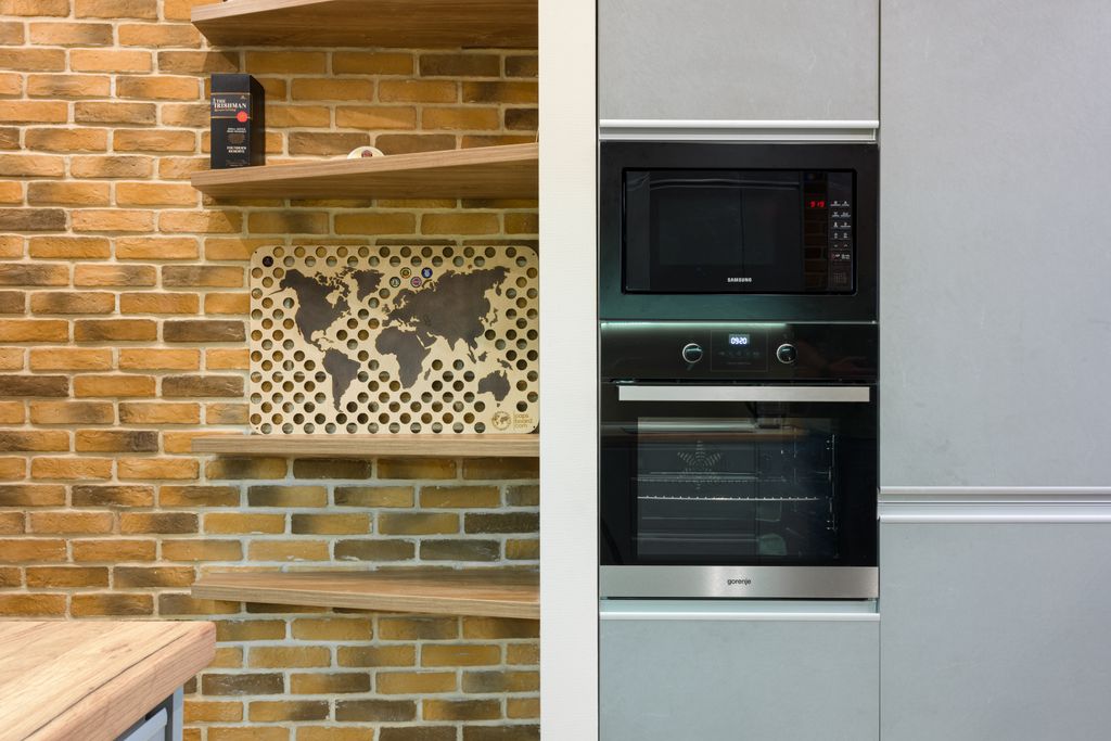 Wall oven repair: built-in wall oven with a microwave above in a modern kitchen